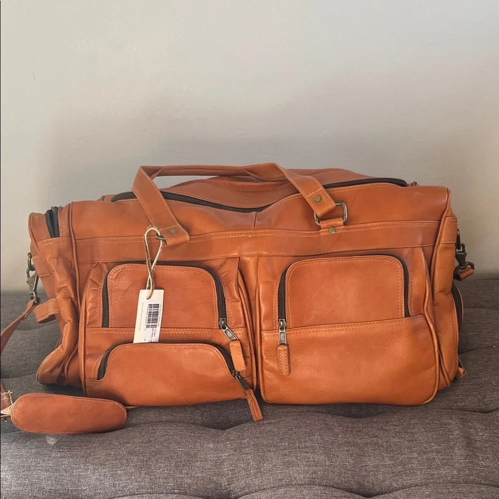 Latico Leather Deluxe leather Travel Bag New with tags